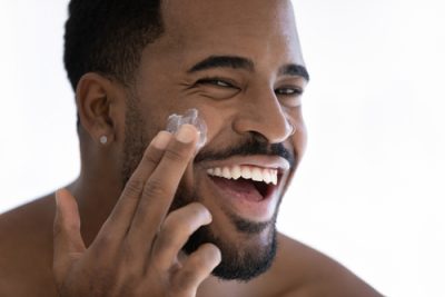 Close,up,portrait,of,happy,young,african,american,man,apply